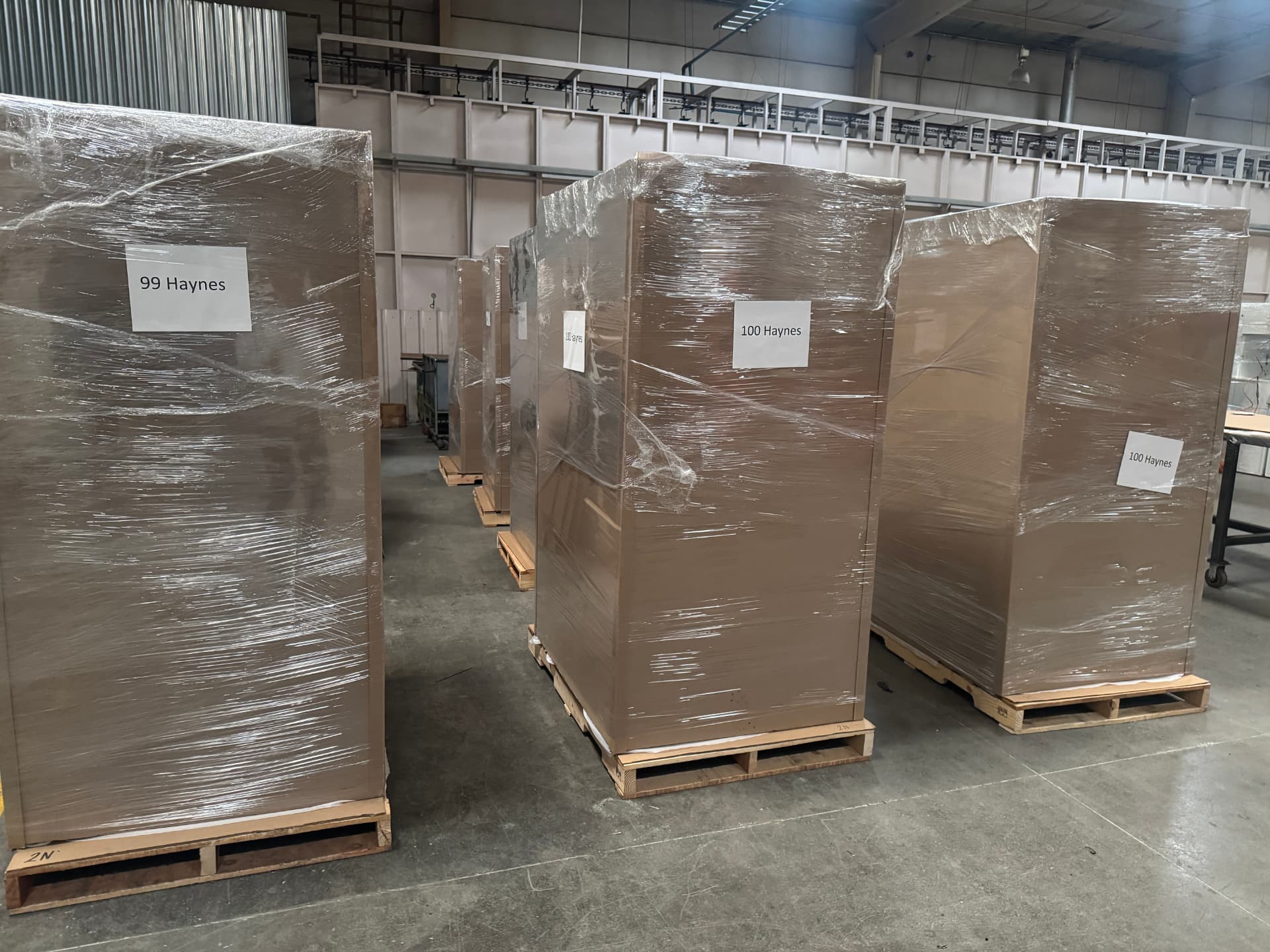 Crated Accessa Parcel lockers on pallets in the warehouse, ready to ship from North America