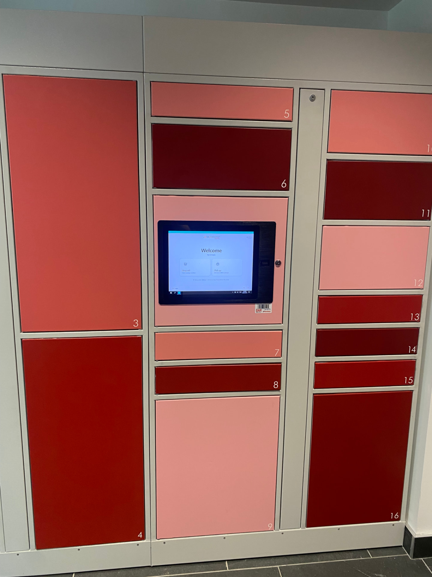 Snaile locker retrofit with Accessa software, custom red and pink door finishes and integrated kiosk