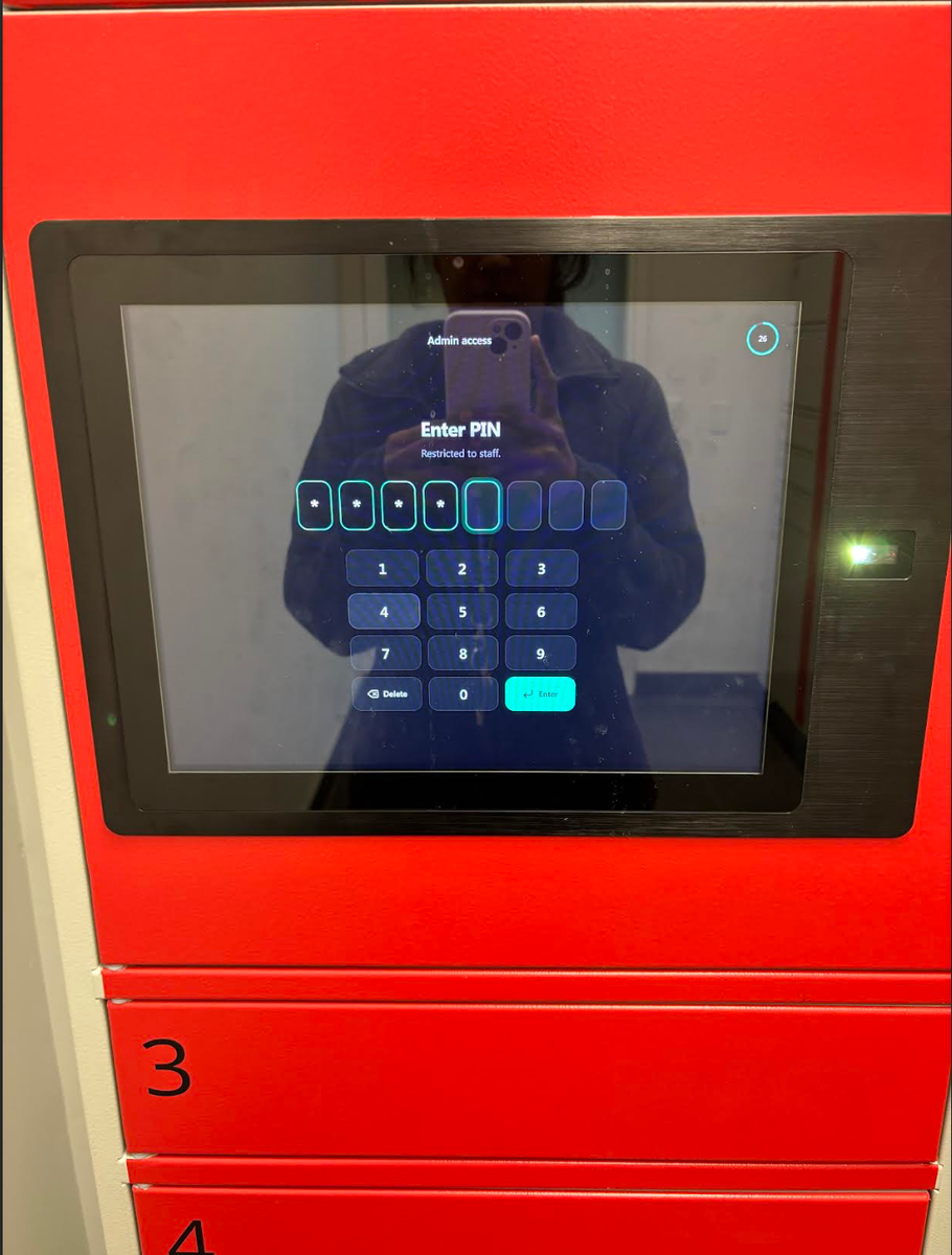 Accessa Parcel kiosk touchscreen showing the staff PIN entry screen